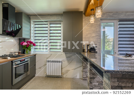 Interior of modern trendy grey kitchen Interior of modern trendy grey kitchen 92552269