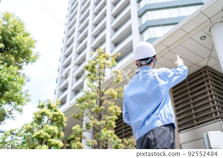 Men's work clothes business inspection looking up 92552484