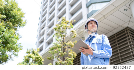 Men's work clothes business inspection looking up 92552487