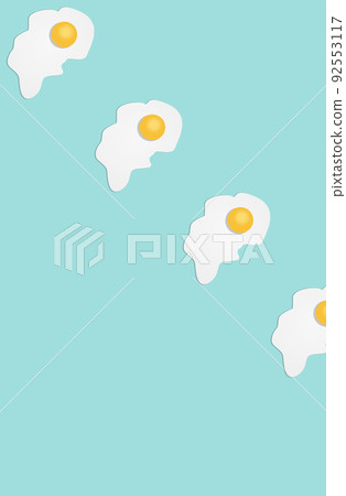 Broken egg on a light blue background Broken egg on a light blue background 92553117