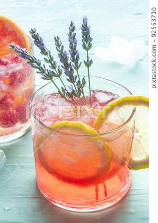 Summer cocktail or mocktail, cold drink with lemon and lavender, party lemonade Summer cocktail or mocktail, cold drink with lemon and lavender, party lemonade 92553710