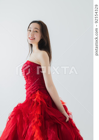 Woman in a red dress 92554329