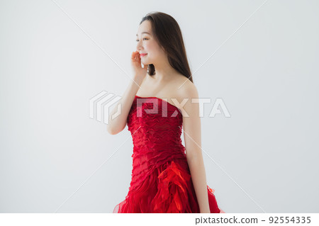 Woman in a red dress 92554335