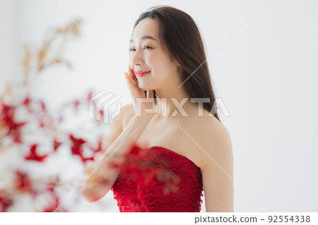 Woman in a red dress 92554338