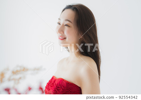 Woman in a red dress 92554342