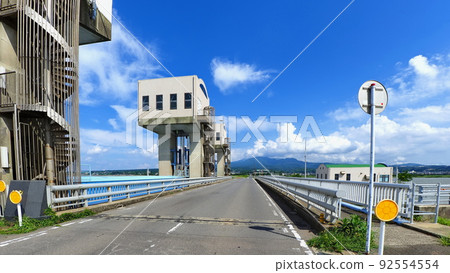 Looking toward Unzen from the southern drainage gate of the Isahaya Bay Reclamation Embankment 2 92554554