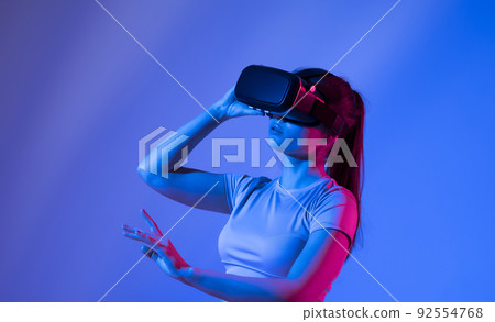 Professional architect using vr glasses at workplace and working with a new architecture project. Future technology concept. 92554768