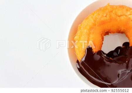 Old-fashioned donuts with chocolate sauce 92555012