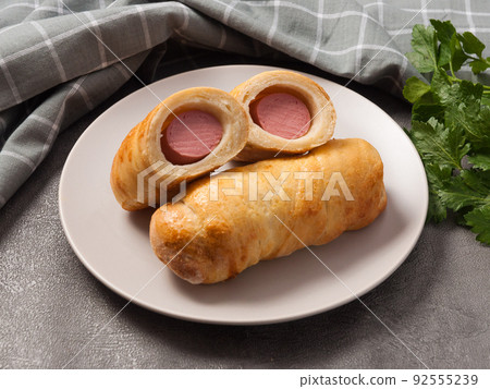 homemade sausages in dough are a favorite children's treat 92555239