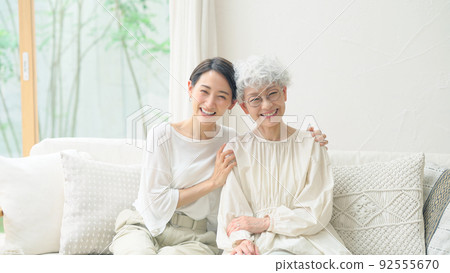 Senior middle-aged woman with a smile, elderly mother and daughter 92555670