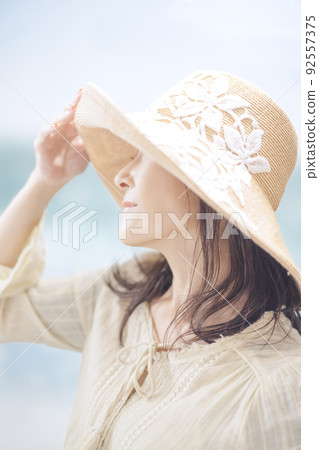 Miyazaki Sea Seaside woman wearing a straw hat 92557375