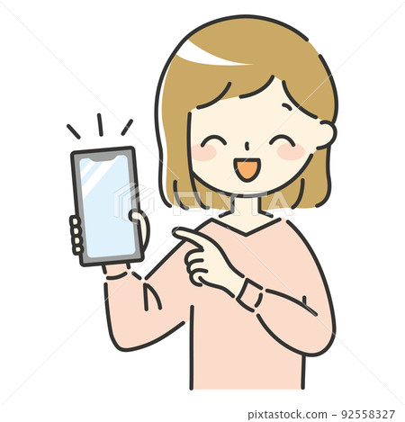 A smiling woman pointing at her smartphone 92558327