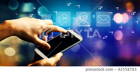 Customer service theme with person using smartphone Customer service theme with person using smartphone 92558783