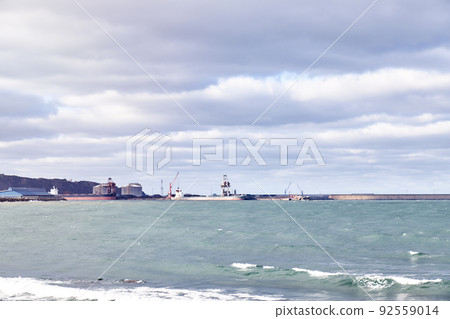 Views of a port loading coal cargo ships Views of a port loading coal cargo ships 92559014