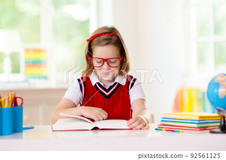 Kids doing homework. Children go back to school. Kids doing homework. Children go back to school. 92561125