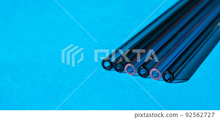 Reusable glass Straws on colorful background Eco-Friendly Drinking Straw Set with cleaning brush Reusable Comfortable Rounded tip Drinking Straw 92562727