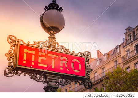 Retro Paris Metro sign in Montmartre, Paris at sunset, France Retro Paris Metro sign in Montmartre, Paris at sunset, France 92563023