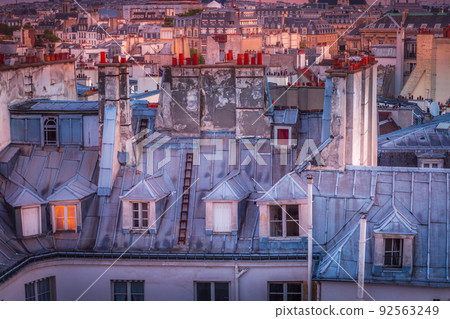 Quarter latin parisian roofs details at dramatic dawn Paris, France 92563249