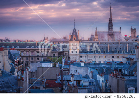 Saint Chapelle and quarter latin roofs at golden sunrise Paris, France 92563263