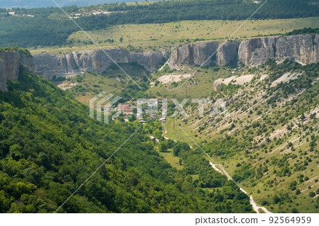 Bakhchisaray town monastery crimea cave assumption old tourism architecture landmark, from landscape nature in famous for city mosque, sunny tower. Outdoor jesus cliff, Bakhchisaray town monastery crimea cave assumption old tourism architecture landmark, from landscape nature in famous for city mosque, sunny tower. Outdoor jesus cliff, 92564959