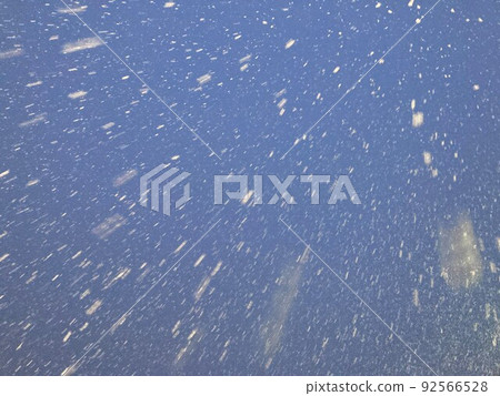 Snow silhouette background falling in the winter night sky 92566528