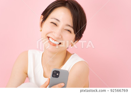 Woman with smartphone Woman with smartphone 92566769