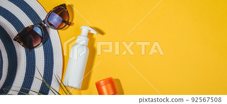 Set of accessories for sun protection on the beach in summer and on vacation, cosmetics, SPF cream 92567508