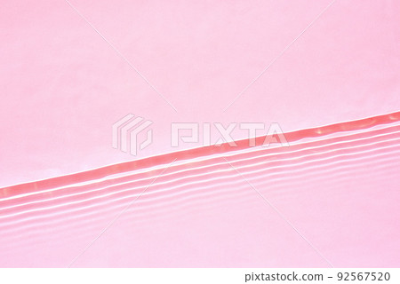 Transparent pink water surface texture with horizontal waves and ripples Transparent pink water surface texture with horizontal waves and ripples 92567520
