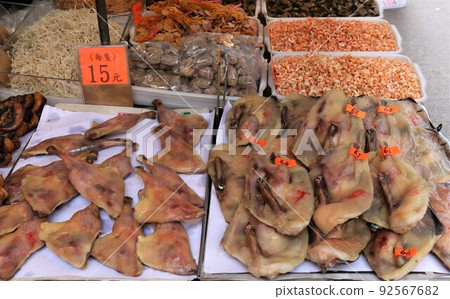 A duck sold in Des Voeux Road West, Hong Kong. A duck sold in Des Voeux Road West, Hong Kong. 92567682