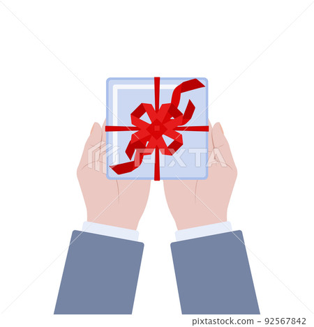 Man giving gift box with a ribbon Man giving gift box with a ribbon 92567842