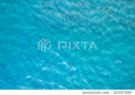 Sea surface aerial view water surface texture, Turquoise sea background Beautiful nature Amazing view seascape background Sea surface aerial view water surface texture, Turquoise sea background Beautiful nature Amazing view seascape background 92567893