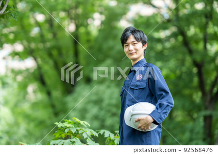 Young security staff patrolling illegal dumping and forests 92568476