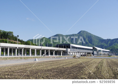 Hokuriku Shinkansen Echizen Takefu Station and Mt. Hino under construction May 2022, Echizen City, Fukui Prefecture 92569856