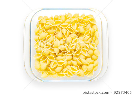 Pasta in a glass plate. Isolated on white. Pasta in a glass plate. Isolated on white. 92573405