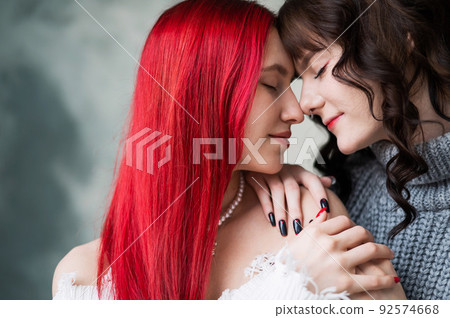 Portrait of young Caucasian women in a relationship. LGBT. Portrait of young Caucasian women in a relationship. LGBT. 92574668
