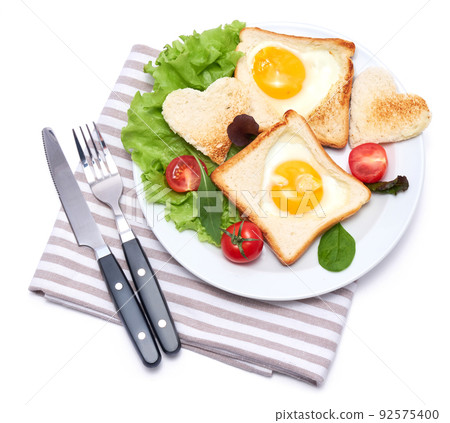 Fried Egg on Toast Bread isolated on white background Fried Egg on Toast Bread isolated on white background 92575400