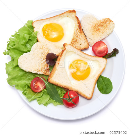 Fried Egg on Toast Bread isolated on white background Fried Egg on Toast Bread isolated on white background 92575402