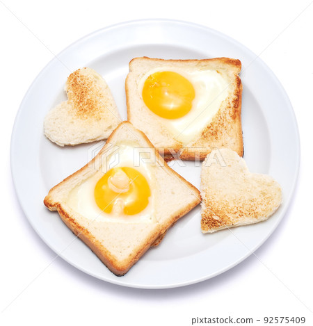 Fried Egg on Toast Bread isolated on white background 92575409