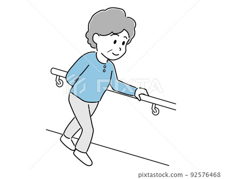 Elderly woman walking by holding on to the railing 92576468