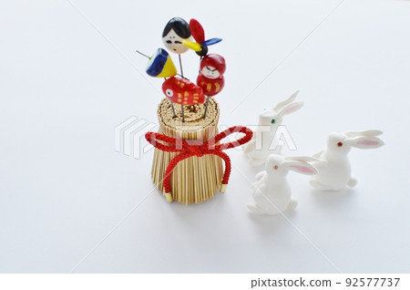 White rabbit made of paper clay and New Year's decoration material 92577737