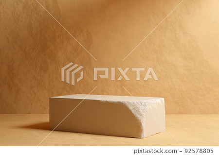 Beige sandstone podium block. Concept of shop product or cosmetic display stand background, skincare advertisement mock up. High quality 3d render. 92578805