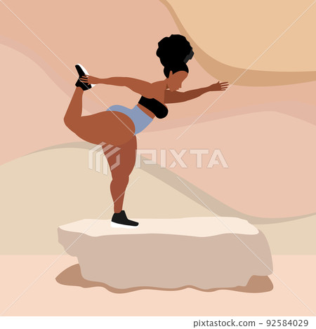 Young woman doing yoga asana. Standing Bow pose 92584029
