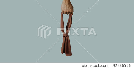 has a blindfold in his hand, web banner has a blindfold in his hand, web banner 92586596