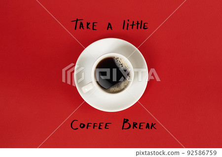 Top view of cup of black coffee and Take a little coffee break lettering isolated on red background Top view of cup of black coffee and Take a little coffee break lettering isolated on red background 92586759