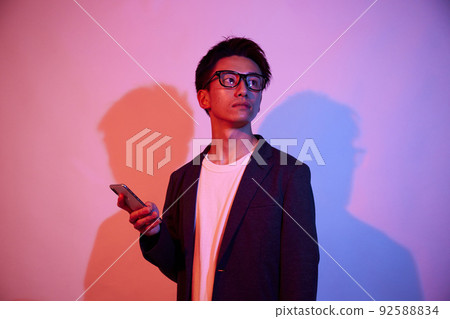 Colorful portrait of a young businessman Colorful portrait of a young businessman 92588834