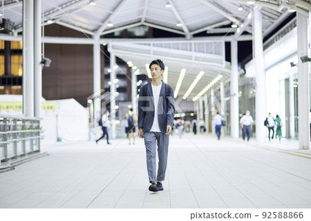 Young businessman and night station 92588866