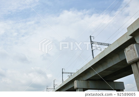 electricity pole on electric sky train track in sunny day 92589005