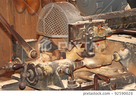 The making of clogs, a traditional Dutch craft of making wooden traditional shoes 92590028