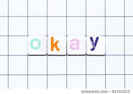 Colorful tile letter in word okay on white grid background Colorful tile letter in word okay on white grid background 92591625