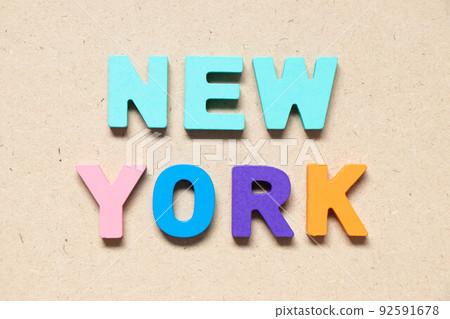 Color alphabet letter in word new york on wood background Color alphabet letter in word new york on wood background 92591678